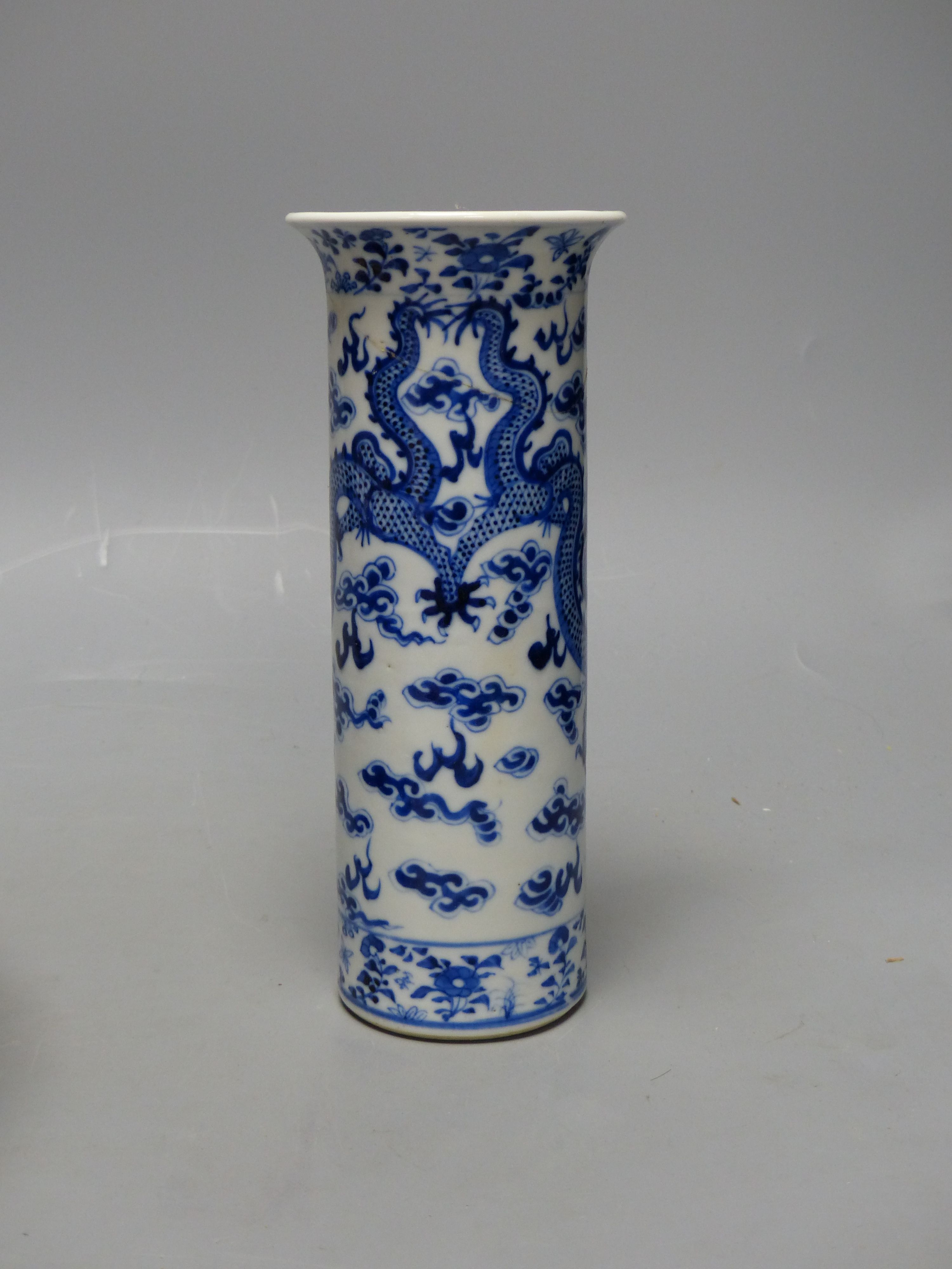 A large Japanese Imari bowl, Meiji period, diameter 31cm, and a Chinese blue and white sleeve vase